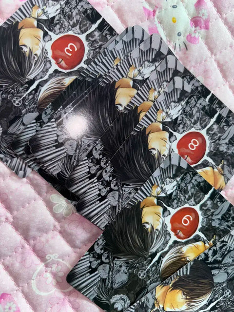 Selling Death Note trading cards, stickers, and merchandise. Includes Light, Misa, and L.