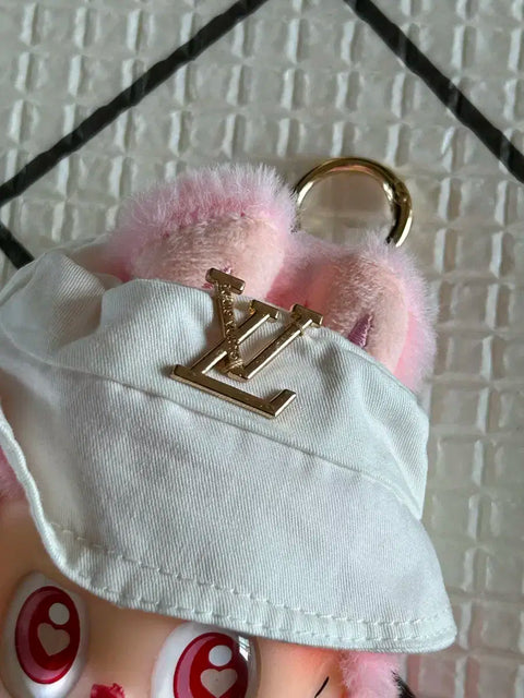 Pop Mart Labubu doll, includes clothing.