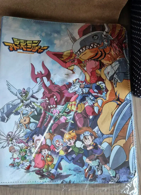 I have a Digimon album. I'll give you the inner pages, which are the size of card sleeves.