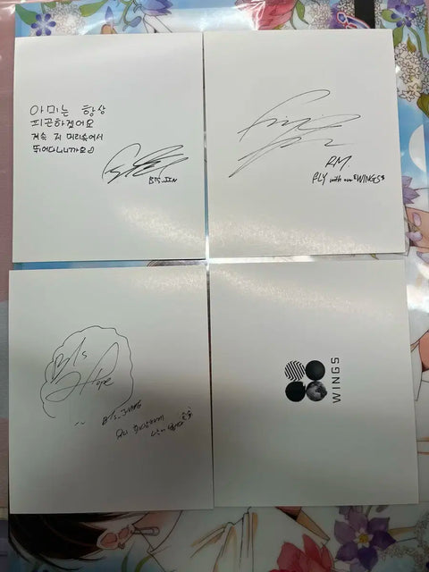 Selling Wings album photocards, completing the Dragon Ball collection.