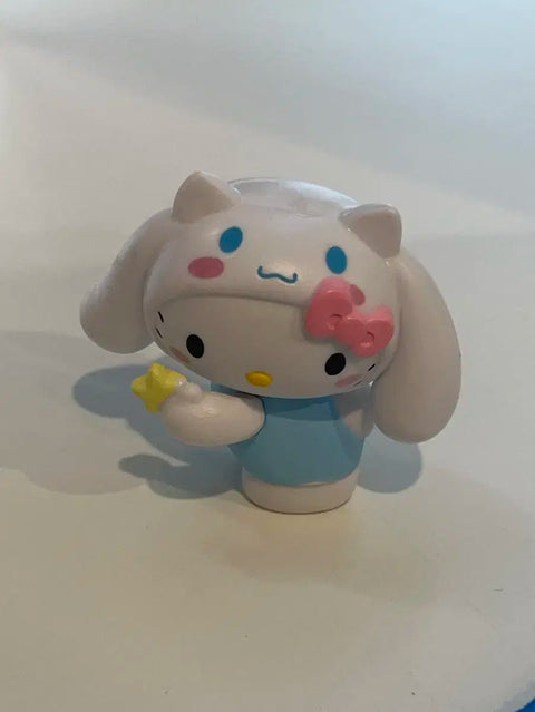 Hello Kitty figure wearing a Cinnamoroll hat