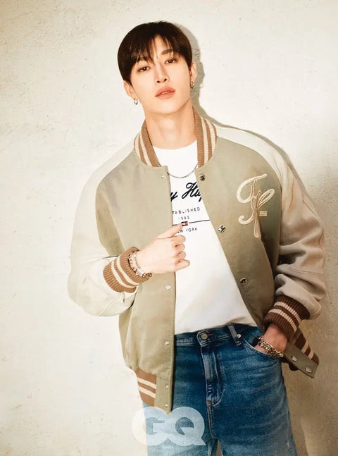 Selling GQ magazine featuring Stray Kids in Tommy Hilfiger pictorial.