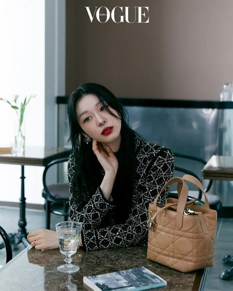 Transfer of Vogue magazine featuring New Jeans' Haerin and Kim Yuna's Dior photoshoot.