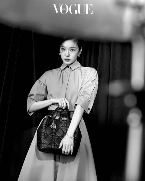 Transfer of Vogue magazine featuring New Jeans' Haerin and Kim Yuna's Dior photoshoot.