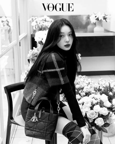 Transfer of Vogue magazine featuring New Jeans' Haerin and Kim Yuna's Dior photoshoot.