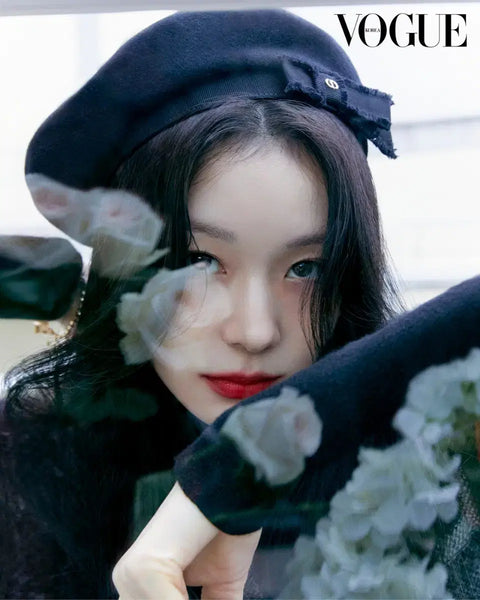 Transfer of Vogue magazine featuring New Jeans' Haerin and Kim Yuna's Dior photoshoot.