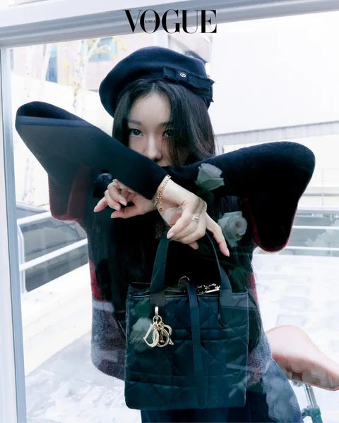 Transfer of Vogue magazine featuring New Jeans' Haerin and Kim Yuna's Dior photoshoot.
