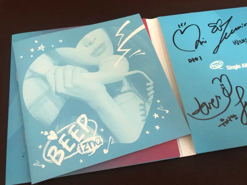 Izna signed album from Dising
