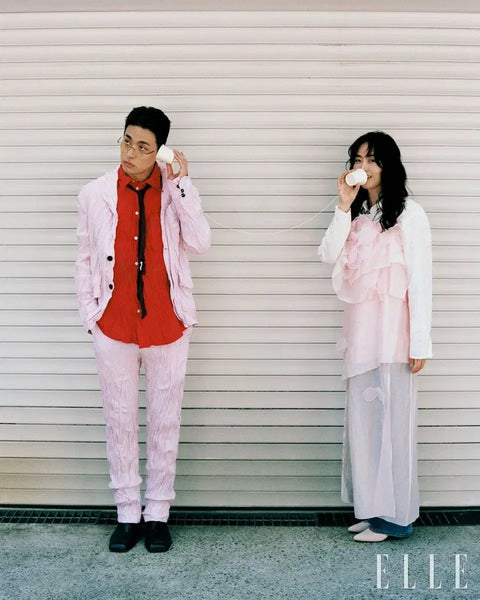 Transfer of Elle featuring actor Park Jung-min and novelist Kim Keum-hee in a photoshoot and interview.