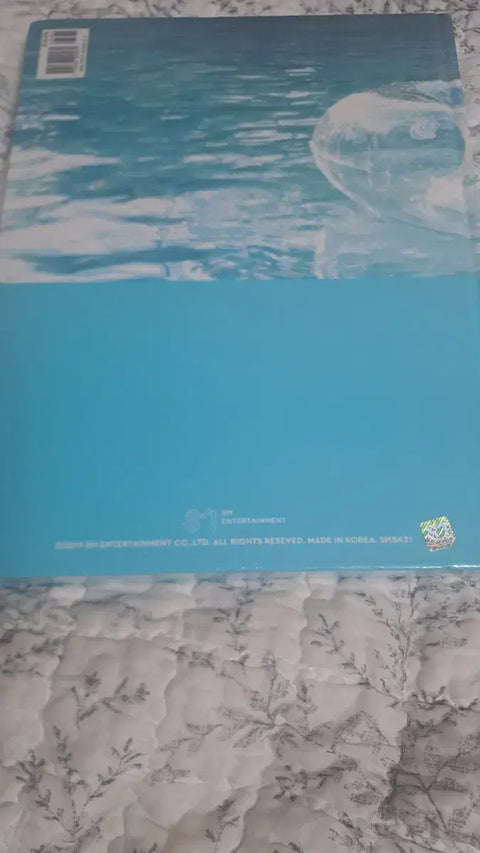 Selling EXO photobook, unopened.