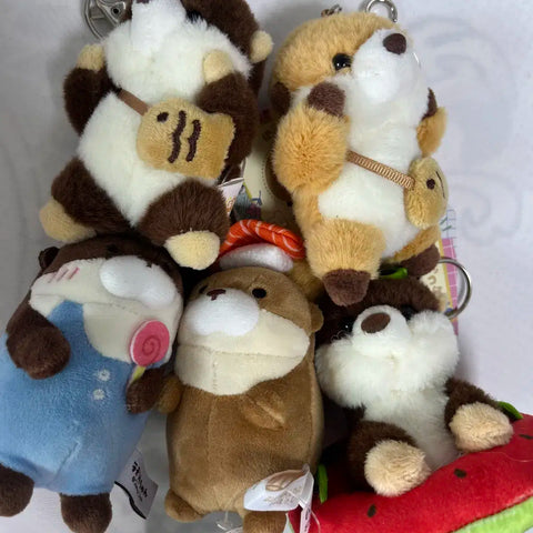 Shotaro otter plushies, all together.