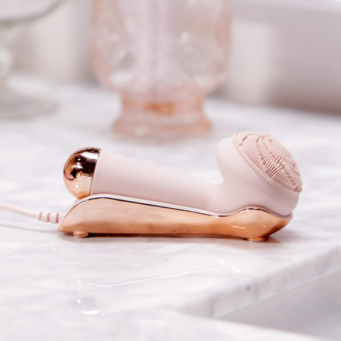 Dispositivo de masaje y limpieza facial de silicona de primera calidad impecable