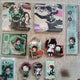 Tanjiro merchandise bundle: figure, acrylic stand, mini acrylic stand, keychain, Kanae, Tanjiro paper goods.