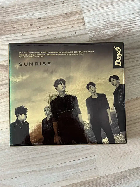 Album Sunrise của DAY6 và bộ ảnh polaroid Dowoon Jae