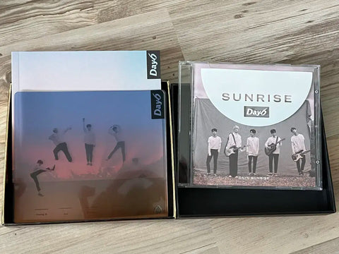 Album Sunrise của DAY6 và bộ ảnh polaroid Dowoon Jae