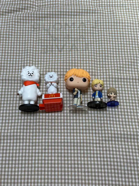 Selling BT21 RJ and BTS Jin figures as a set.