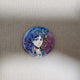 Selling Attack on Titan Eren Yeager can badge.