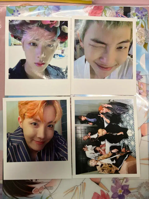 Selling Wings album photocards, completing the Dragon Ball collection.