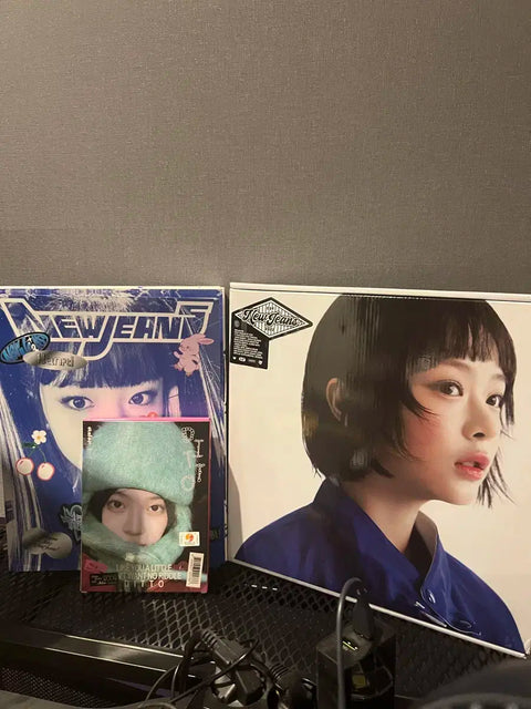 Selling New Jeans Hanni's albums as a bundle.