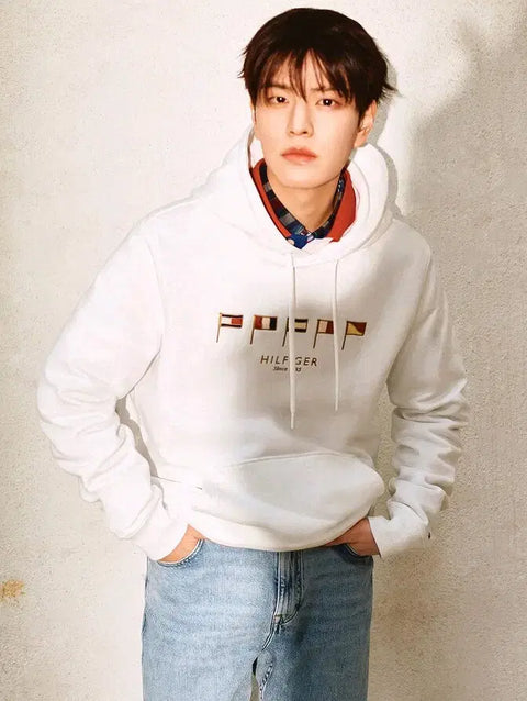 Selling GQ magazine featuring Stray Kids in Tommy Hilfiger pictorial.
