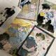 Family photo folder package of a pond where flowers fall.