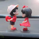 Couple figurines, 1 set for 3000 won.