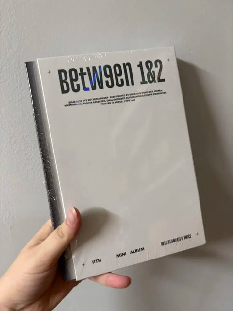 TWICE between Unopened