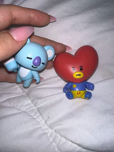 Selling BTS figures Tata and Koya, all together.