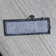 Kim Wonpil's name tag