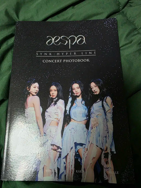 Selling aespa's first concert photobook.