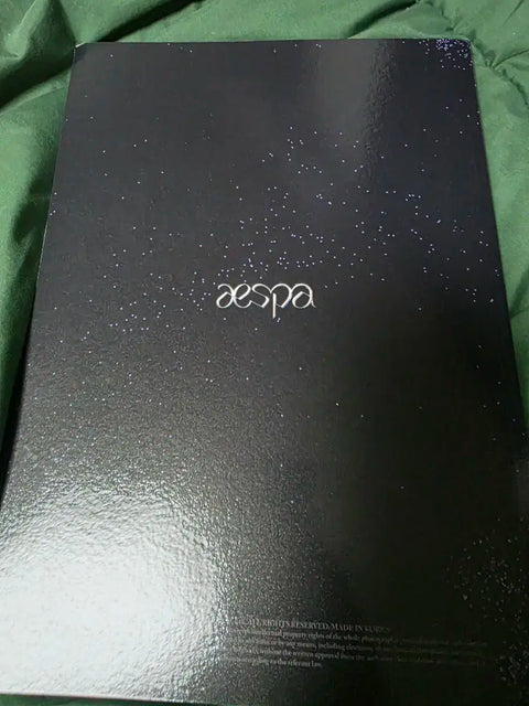 Selling aespa's first concert photobook.
