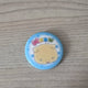 Selling Bonekdo Woonhak pin badge.