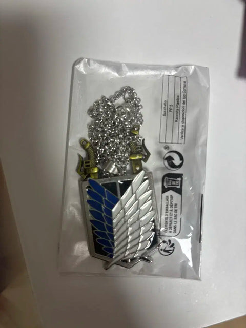 Selling unopened Attack on Titan Survey Corps keychain.