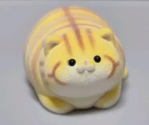 Yellow cat figurine