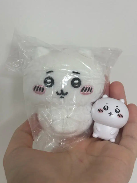 I'm selling a set of Chiikawa seated plushie + figure!
