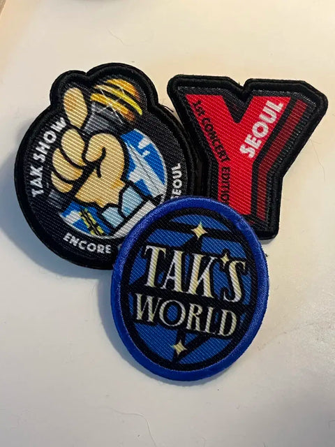 Selling Young Tak's Tak Show concert badges cheaply as a set!