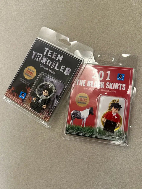 The Black Skirts Concert Merch Keychain 201 Tinted Troubles
