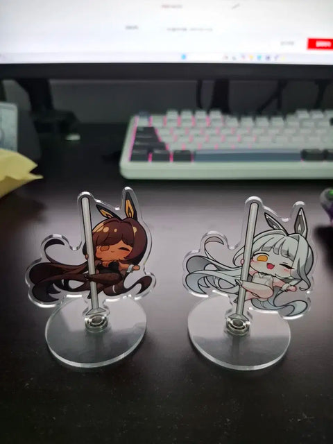 Selling NIKKE rotating acrylic stands Nuar and Blanc as a set.