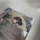 Selling Attack on Titan Mikasa can badge.