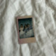 Selling a group signed polaroid of IZ*ONE Kim Min-ju, Chae-yeon, and Eun-bi.