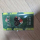 Selling "Frida" the Musical badge.