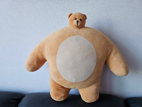 I'm selling a small-headed bear doll.