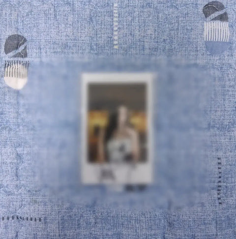 Selling Oh My Girl YooA's handwritten autograph polaroid.