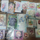 Hololive-focused VTuber can badges, acrylic stands, and other merchandise - all together