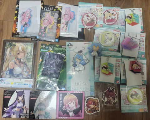 Hololive-focused VTuber can badges, acrylic stands, and other merchandise - all together