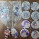 Hololive-focused VTuber can badges, acrylic stands, and other merchandise - all together
