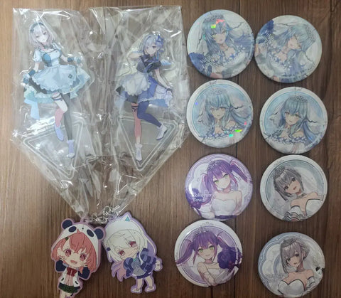 Hololive-focused VTuber can badges, acrylic stands, and other merchandise - all together