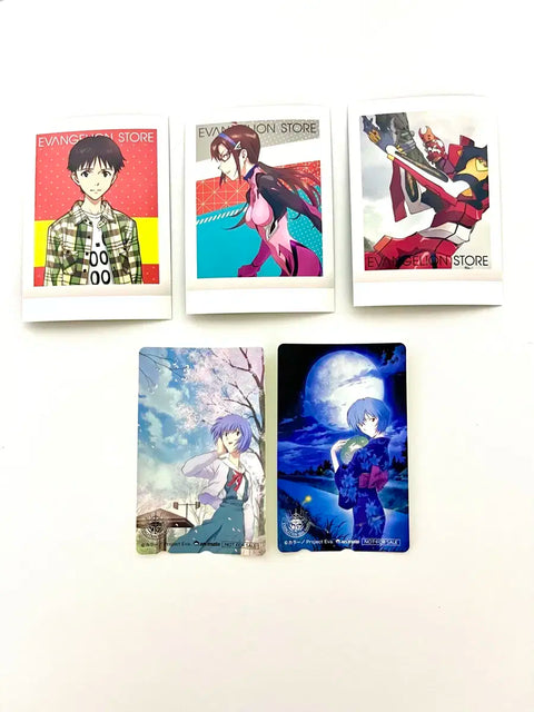 Selling Neon Genesis Evangelion goods: Pasha Colle, photo cards, and stickers as a bundle.