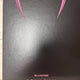 Blackpink photocards and opened albums, selling as a set.