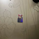 Selling Kang Hae-rin photocard.